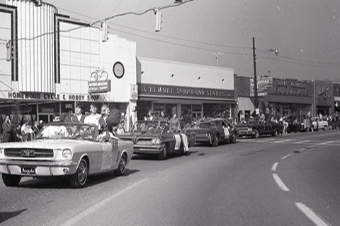 Procession of cars, Homecoming Parade 1966
