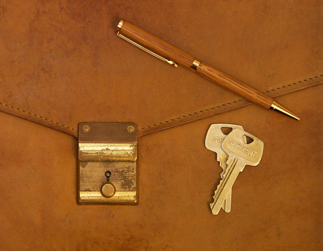 Westmoreland's keys, pen and leather valise