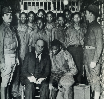 [1933 UPI] Scottsboro boys with Leibowitz in jail